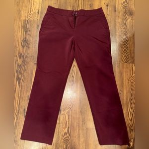 Women’s Apt 9 maroon dress pants - ripped seam at bottom cuff of one leg